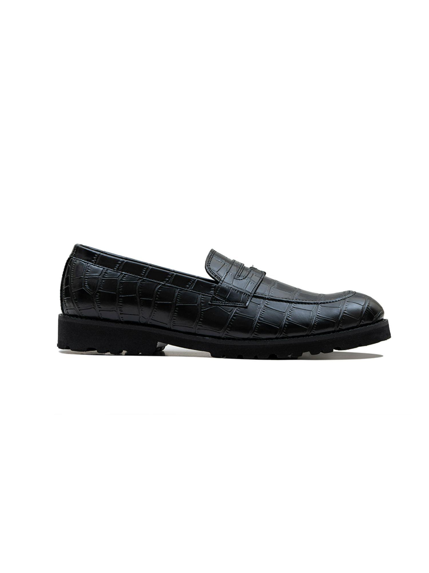 crocotextured black slip ons