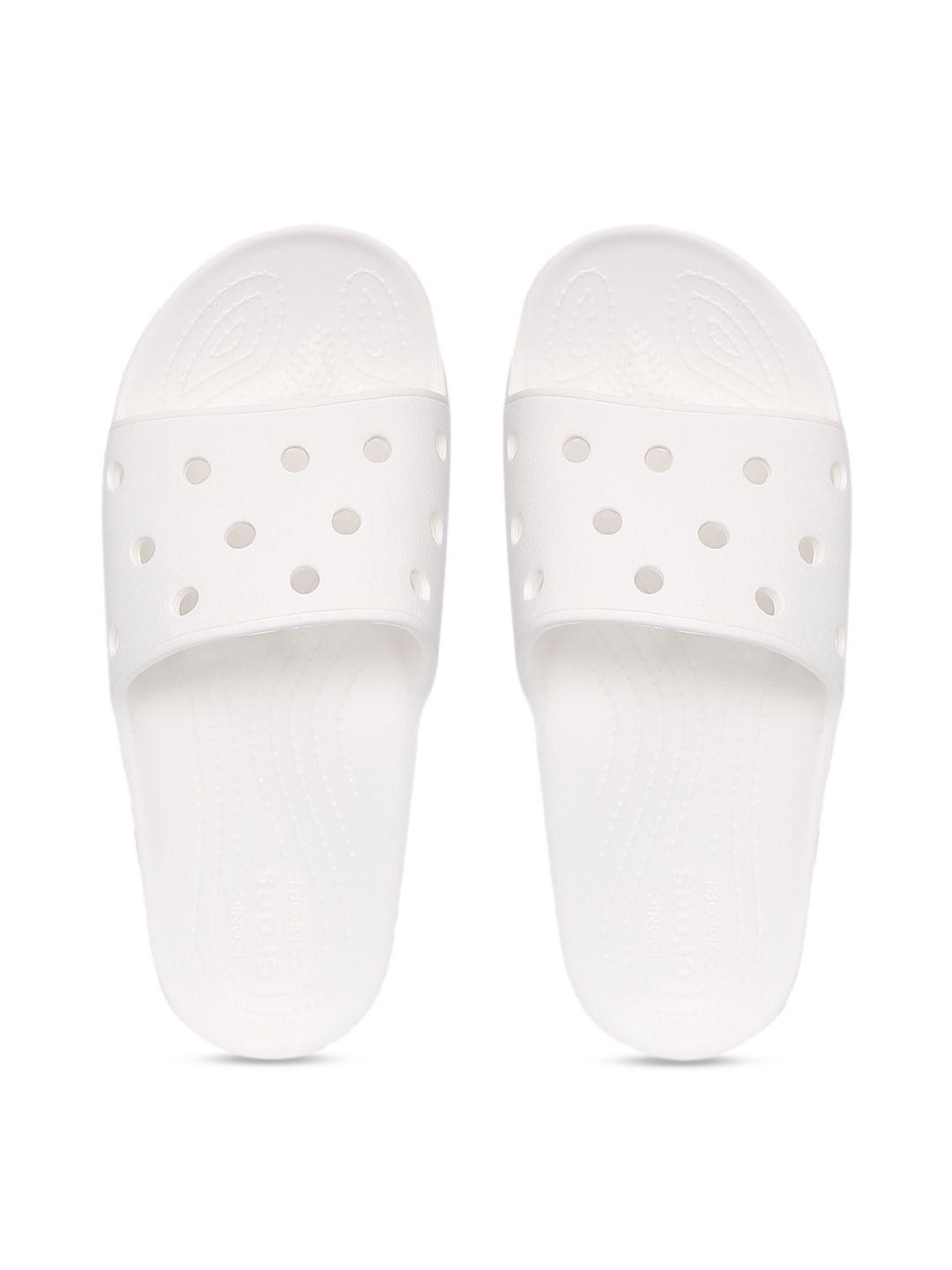 crocs classic  unisex white solid sliders with cut work detail