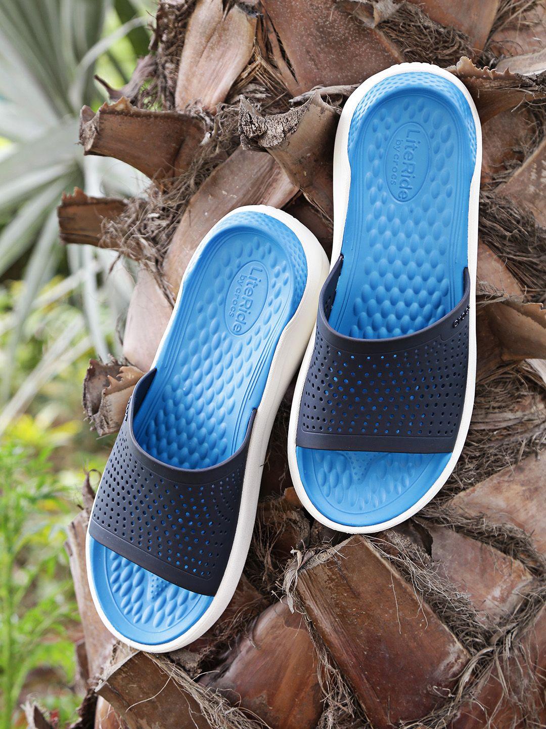 crocs literide men blue solid sliders with cut-out detail