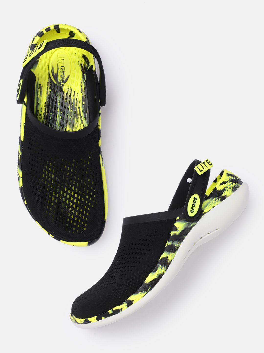 crocs unisex black & fluorescent green croslite clogs with abstract print and cut-outs