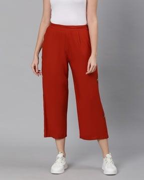 cropped pants with button accents