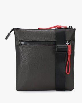 crossbody bag with logo zip puller