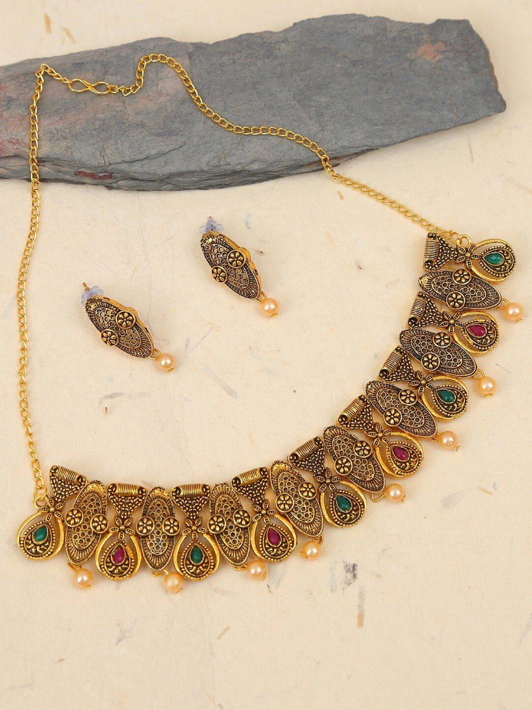 crunchy fashion enamelled gold-plated red & green kundan studded & beaded jewellery set