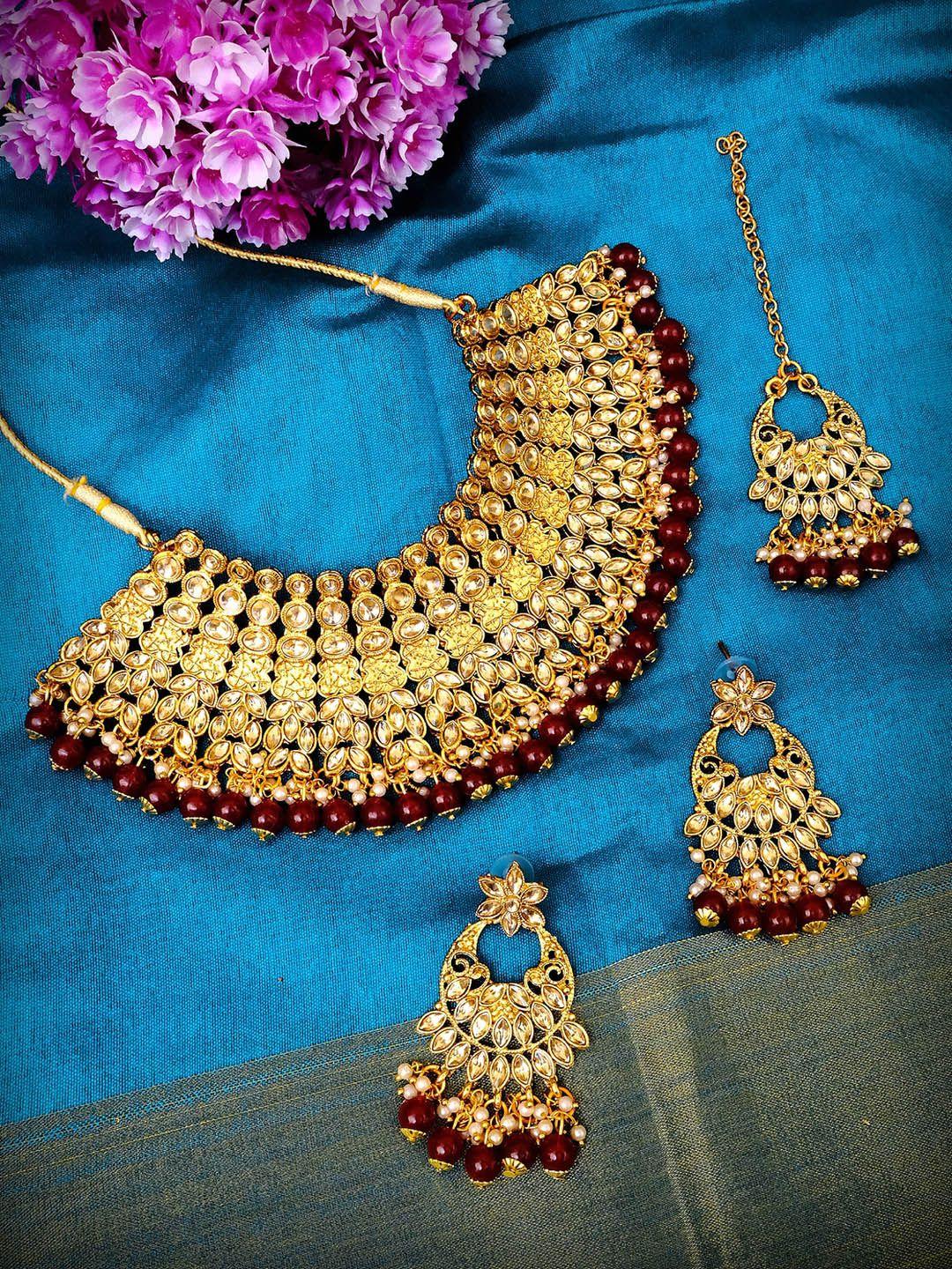 crunchy fashion gold-plated beige & red stone-studded & beaded antique jewellery set