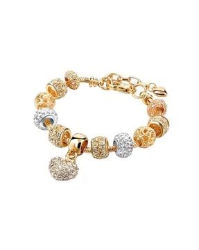 crystal-studded bracelet with heart-shaped charm