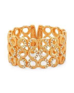 crystal-studded cuffs