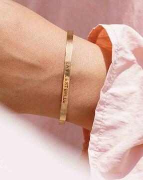 cuff bracelet with text print