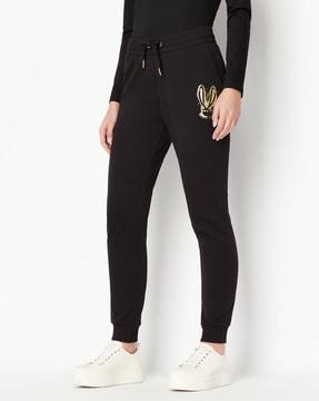 cuffed track pants with foil print