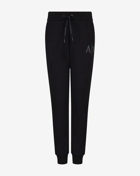 cuffed track pants with logo print