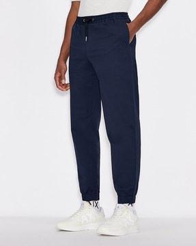 cuffed trousers with slant pockets