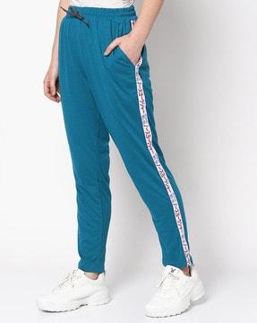cuffed track pants with contrast taping