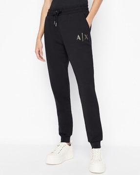 cuffed track pants with elasticated waistband & logo print