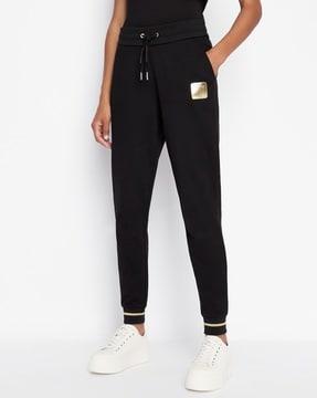 cuffed track pants with logo print