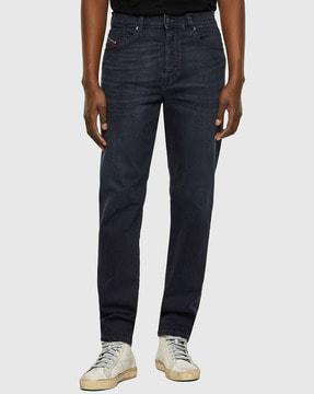 d-fining tapered fit regular waist washed stretch jeans