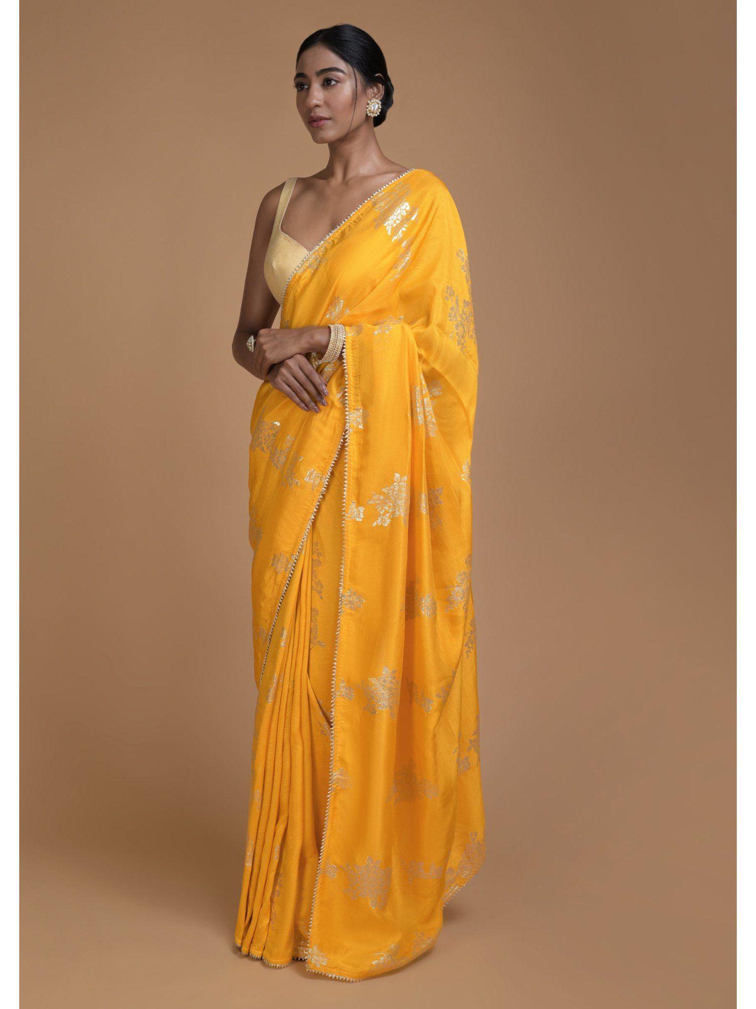 dandelion yellow saree in silk with weaved floral motifs with unstitched blouse
