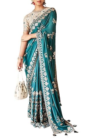 dark green embroidered saree with unstitched blouse