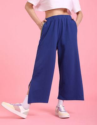 dark blue elasticized waist cropped track pants