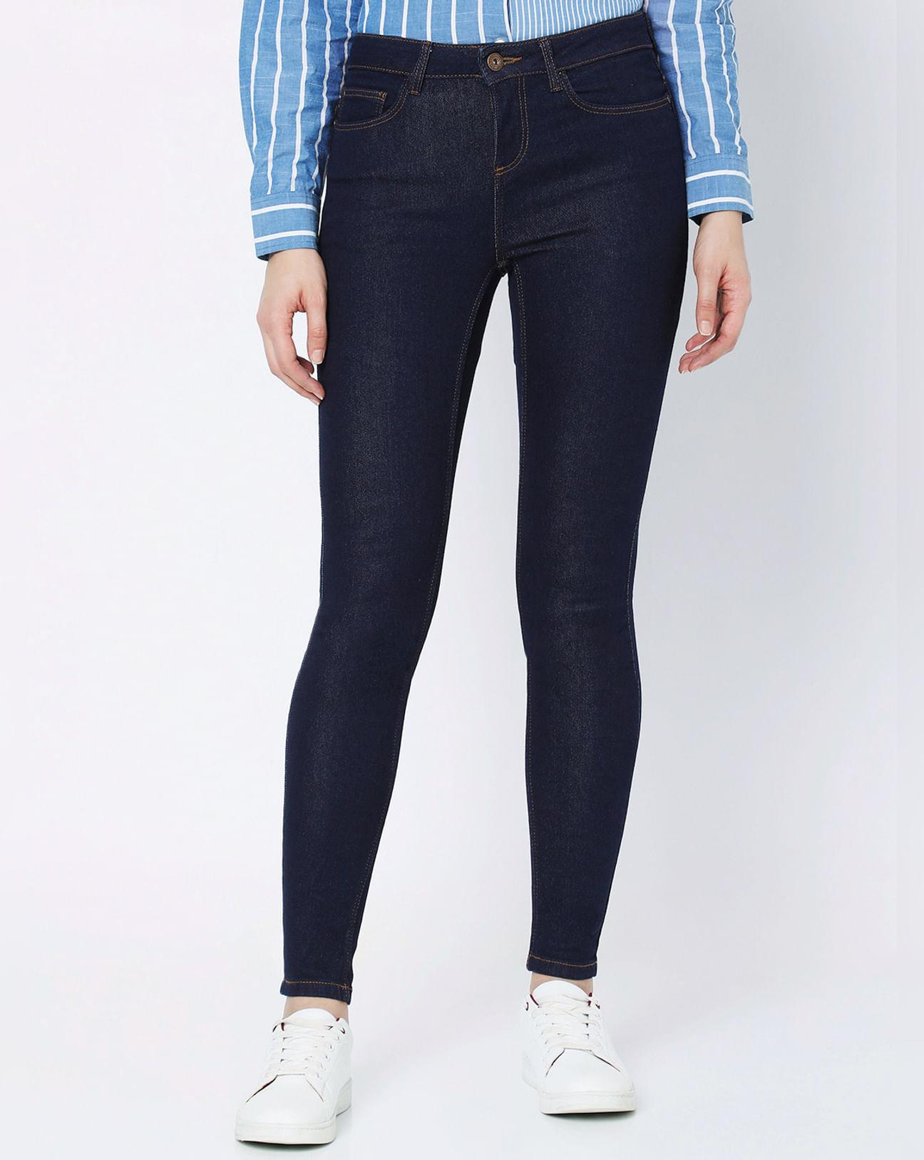 dark blue mid rise skinny jeans