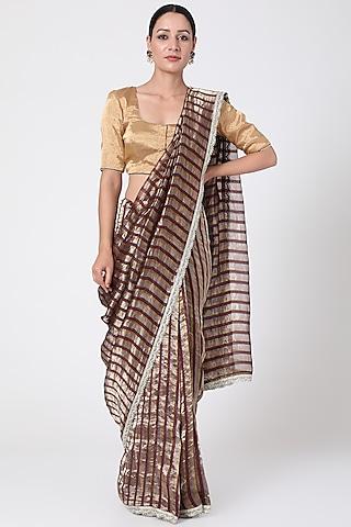 dark brown striped saree with zari edging