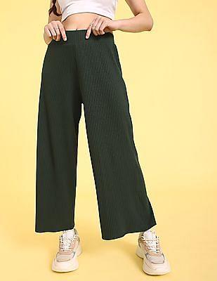 dark green elasticized waist flared solid knit trousers
