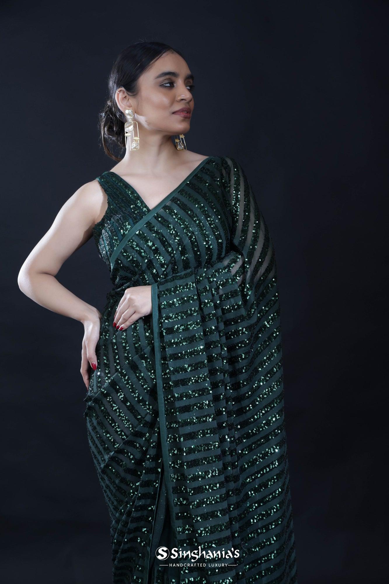 dark green net designer saree