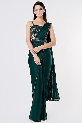 dark green saree set with embroidery