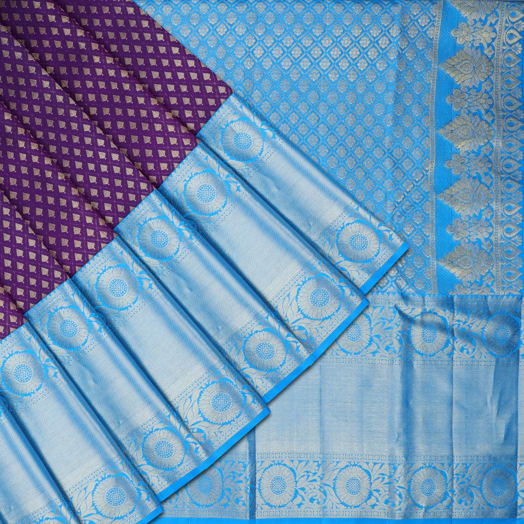 dark violet kanjivaram silk saree with tiny floral buttis