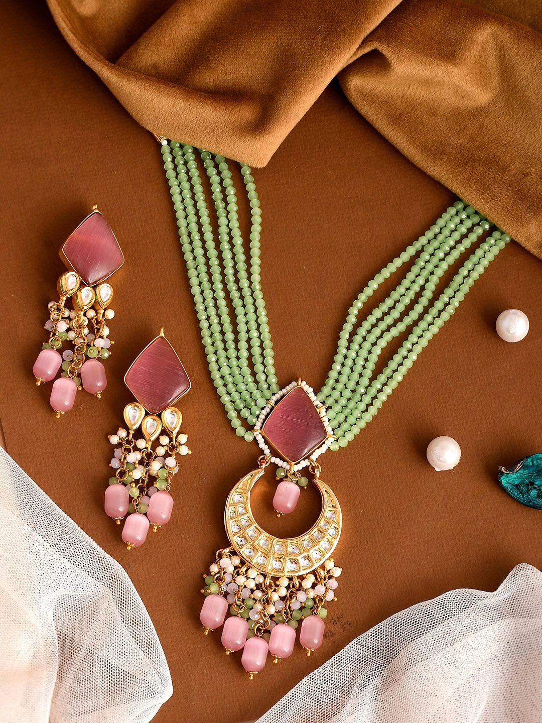 dastoor gold-plated & pink kundan stone-studded & green beaded jewellery set