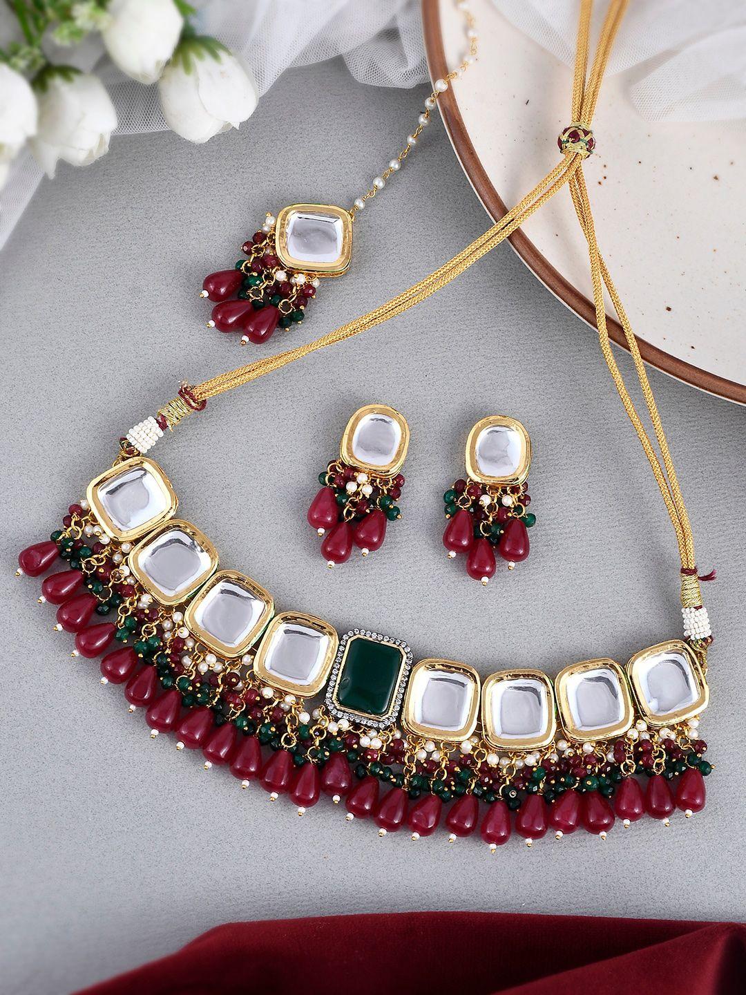 dastoor gold-plated kundan-studded jewellery set