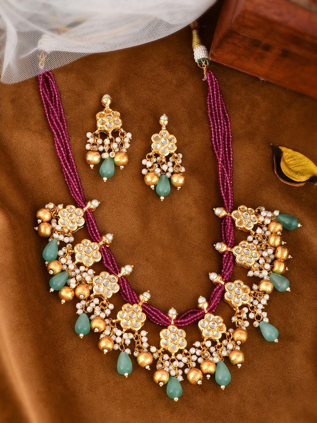 dastoor gold-plated blue stone studded jewellery set