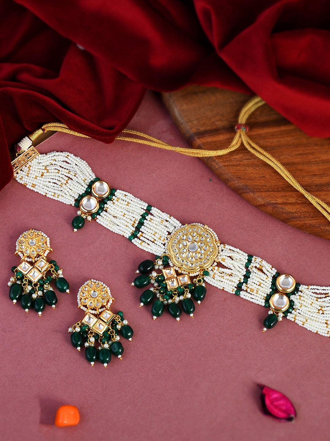 dastoor gold-plated green kundan studded choker jewellery set
