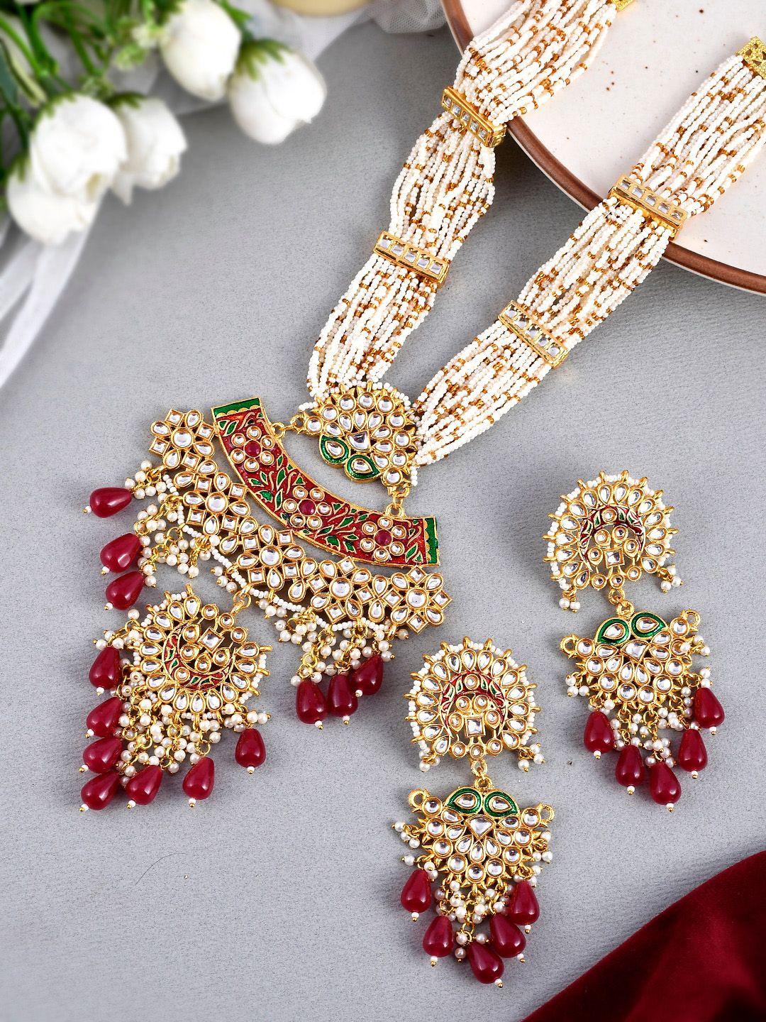 dastoor gold-plated kundan and artificial stone studded jewellery set