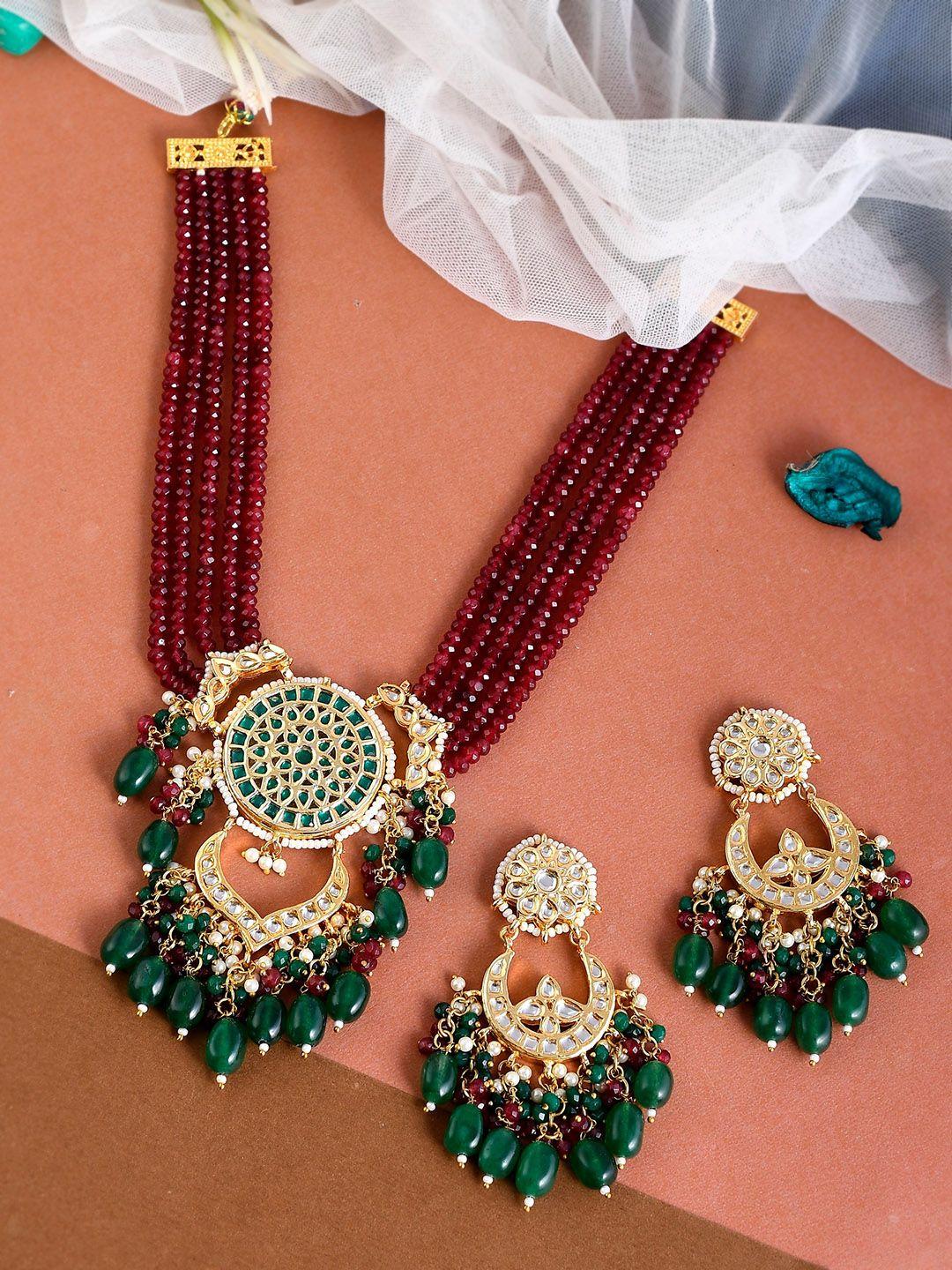 dastoor gold-plated kundan beaded & studded jewellery set