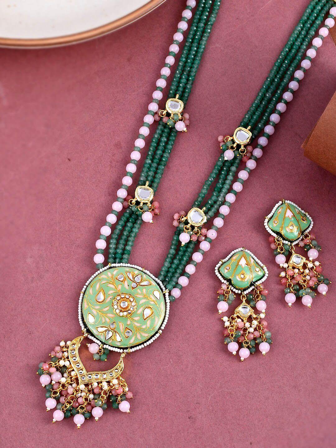 dastoor gold-plated kundan studded brass jewellery set