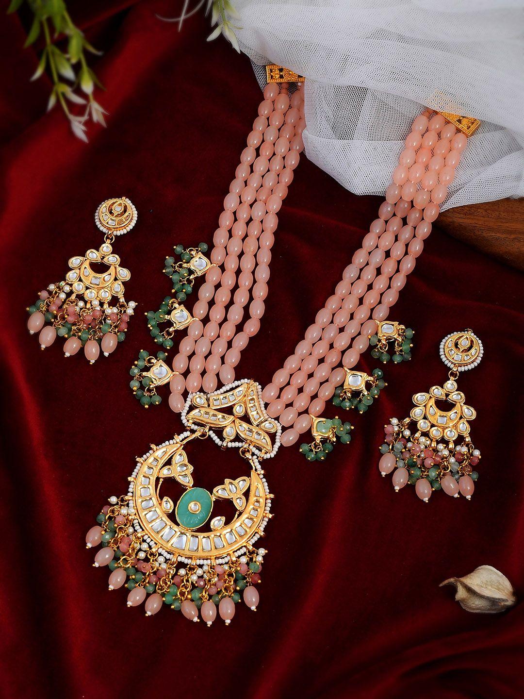 dastoor women peach & green gold-plated kundan-studded & beaded jewellery set