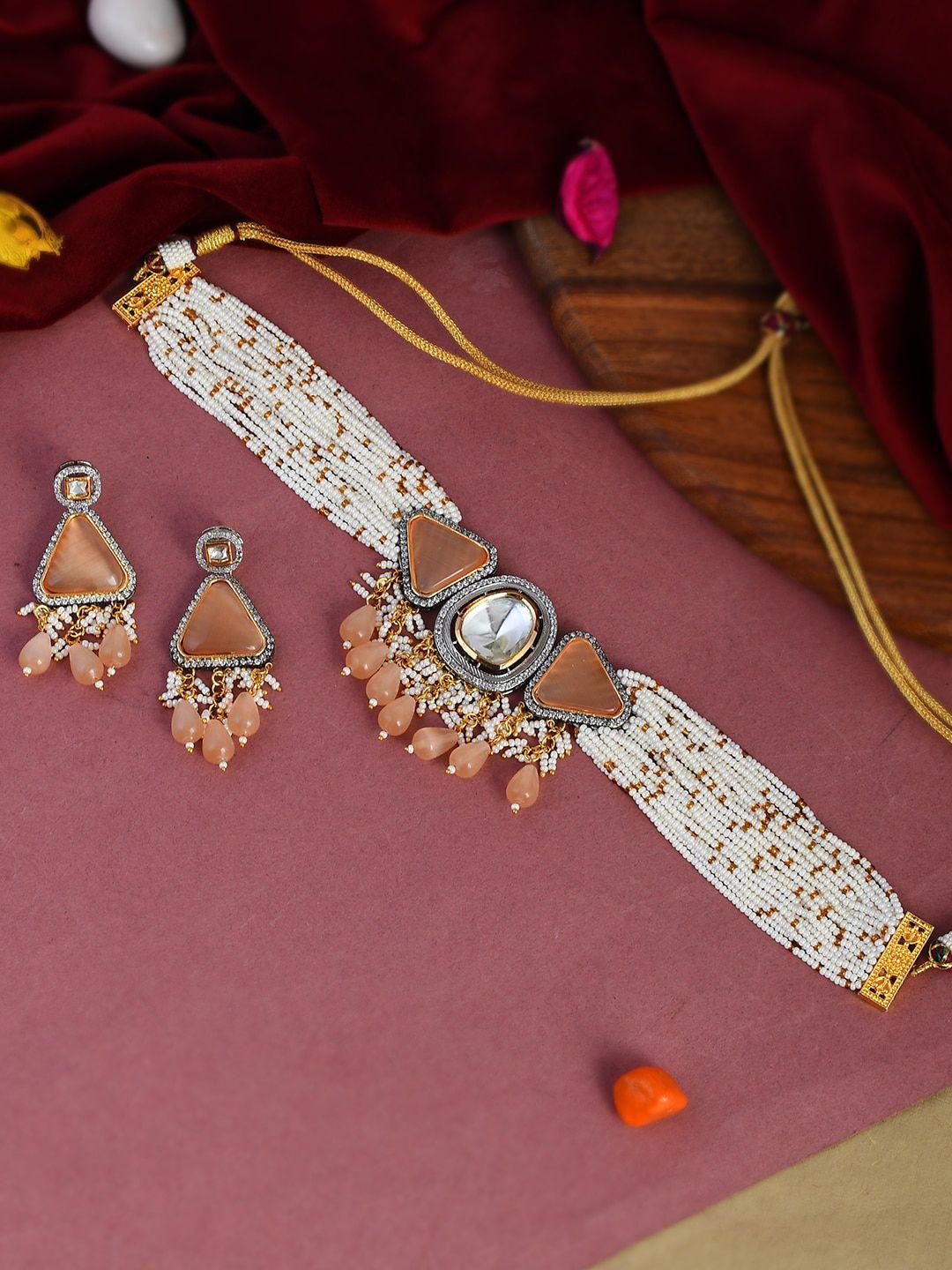 dastoor women white coloured gold plated & kundan studded choker jewellery set