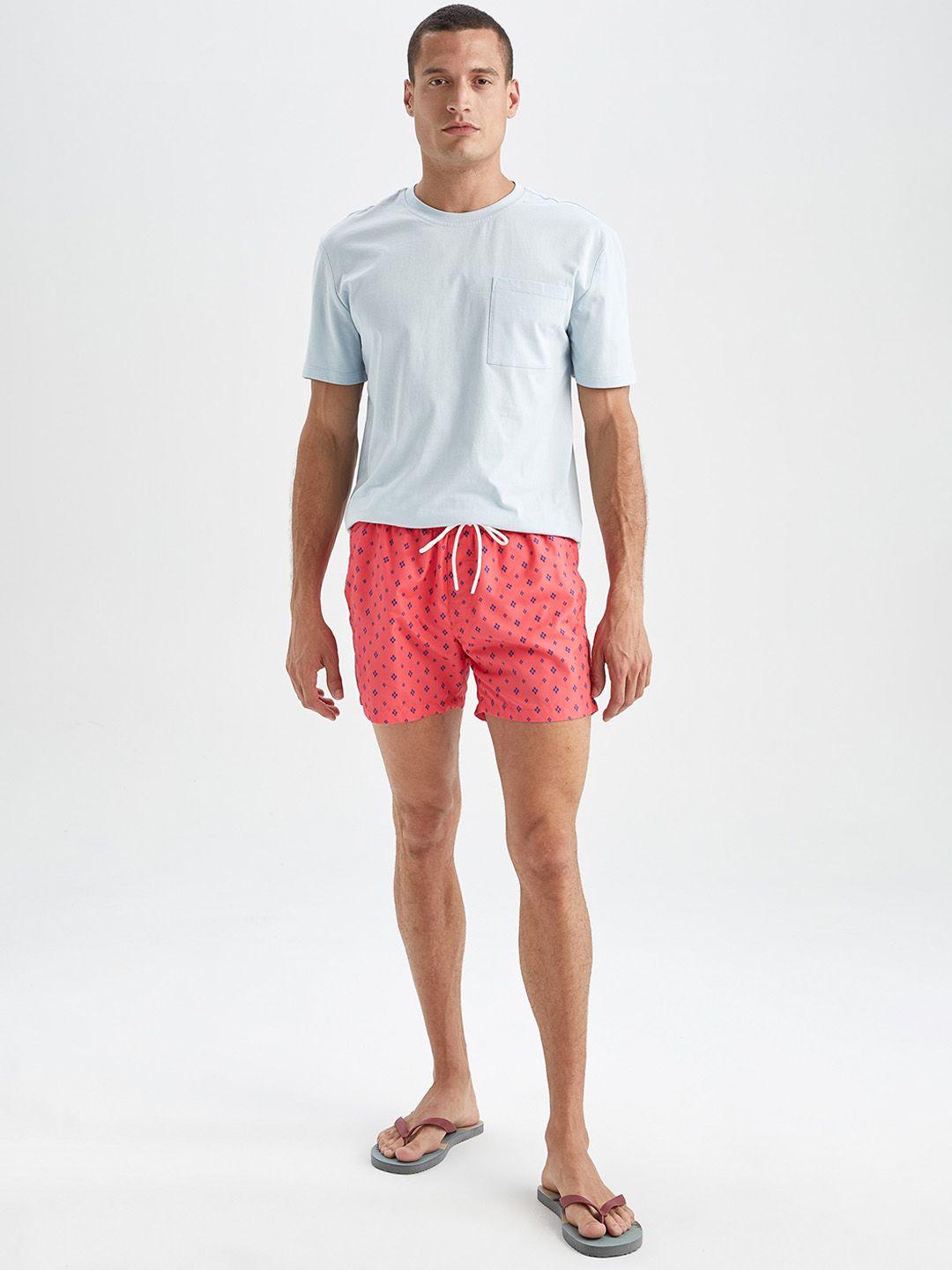 defacto men printed mid rise shorts