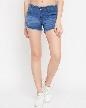 denim shorts with fringed hem