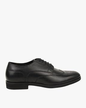 derby shoes with wing-tip broguing