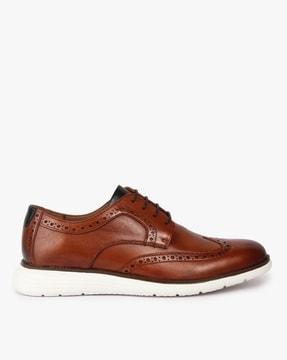 derby shoes with wing-tip design