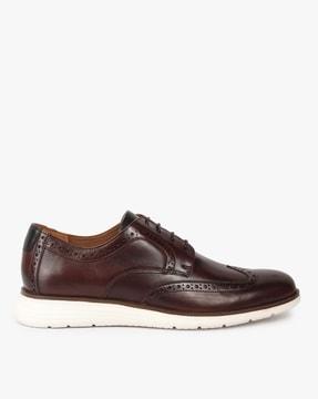 derby shoes with wing-tip design