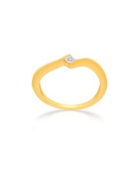 diamond-studded yellow-gold ring