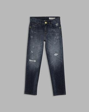 distressed mid-rise washed jeans