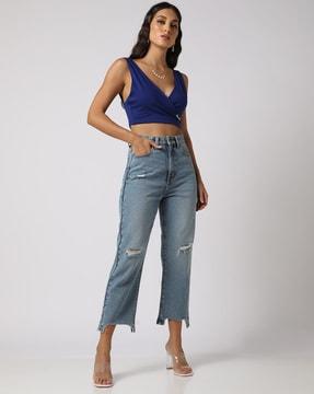 distressed lightly washed boyfriend jeans