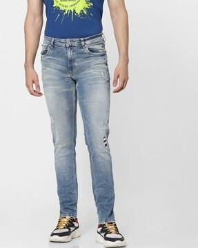 distressed low-rise regular fit jeans