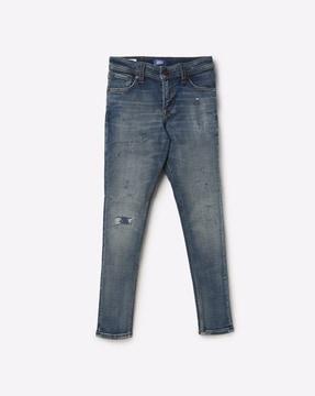 distressed mid-wash jeans