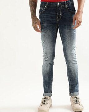 distressed skinny jeans