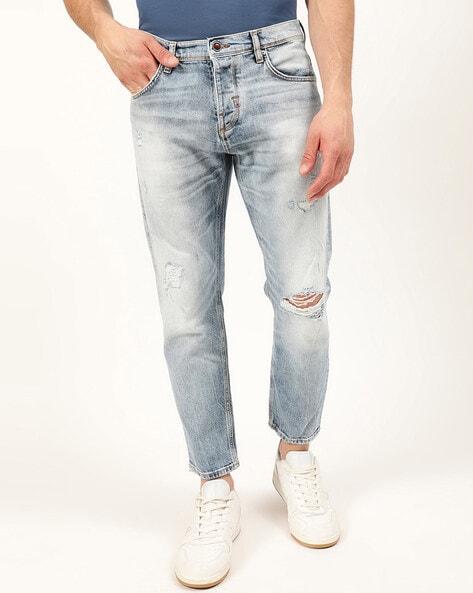 distressed slim jeans