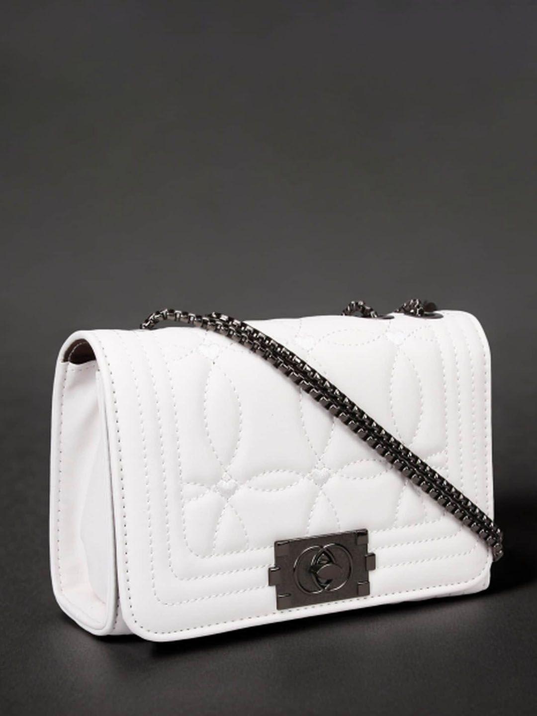 diva dale textured structured sling bag with quilted details