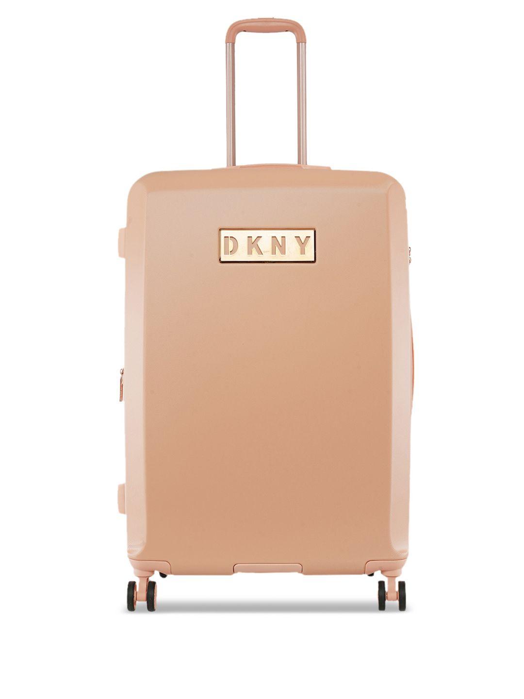 dkny pink solid hard-sided large trolley suitcase